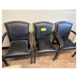Five chairs and a coat rack