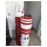 Stacks of 5 gal buckets and lids