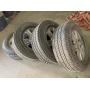 4 Firestone Tires w/ Ford Rims