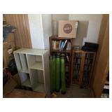 DVDs, cds, books, book shelves