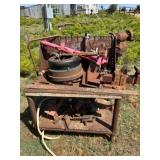 Bench grinder and metal work bench with vise