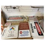 Danger and oilfield signage, license plates