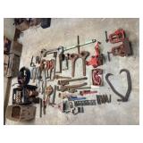 Pipe vises, pipe wrenches, pipe cutters