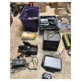 VHS recorders, vhs player/tv, laptop, camera,
