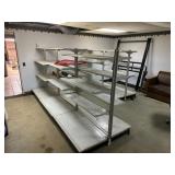 Shelves, heavy sign frames, couch, attic ladder,