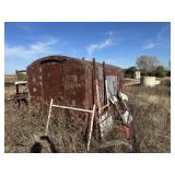 Metal building/pipe holder and contents