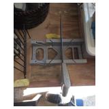 Manual miter box with a hand saw