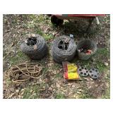2 rolls of barb wire, fencing supplies, misc.
