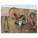 Contents of wall: 4-way, hatchet, fence charger,