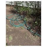 2 Rakes, 2 Watering Hoses, 1 Sprinkler