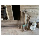 2 Propane Tanks(feel empty), Saws, Scythes,