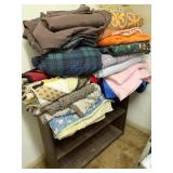 Blankets, Bookshelves, and Outdoor Cushions