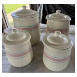 4 McCoy Pottery Cannisters w/ Lids