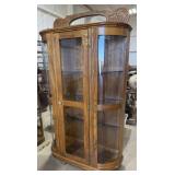 Vintage Oak Curio Cabinet Featuring Curved Glass
