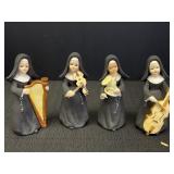 Set of 4 Napcoware Japan Musical Nun Figurines,