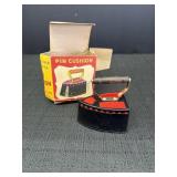 1969 steam iron pin cushion w/tape measure, has