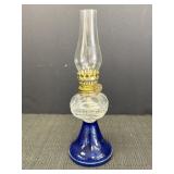 Clear over cobalt blue glass oil lamp, 9.5in tall