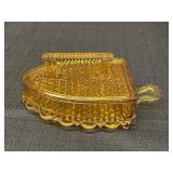 Dark Amber glass flat iron covered dish.  9 x 4in