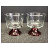 2 mini trifle bowls, clear glass w/red pedestals.