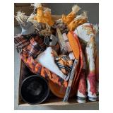 Scarecrows, plates, linens, ribbon fall decor