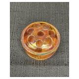 Marigold carnival glass flower frog.  2.5in dia. &