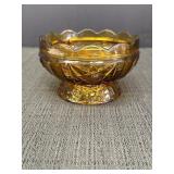 Amber glass candy dish, 4.5in dia. X 3in high.