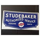Studebaker Authorized Service embossed metal sign,