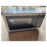 Microwave Oven Model No. EM720C2WT