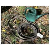 Watering Can & Black Garden Hose