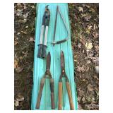 Bow saw & 3 hedge trimmers