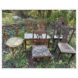 Variety of 6 chairs wood chairs, 2 are matching.