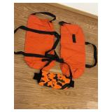 2 orange hunting backpacks & hunting hand muff