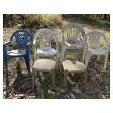 7 Plastic Outdoor Chairs & 2 Tables