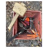 Snips, saw, wrench, caulk gun, wooden mallet