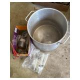 Aluminum stock pot & syringes, scissors, tape.