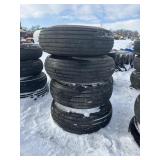 4- Titan 9.5L-15 Tires On 12 Lug Rims