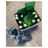 Variety of green plastic serving items - cups,