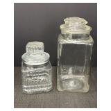 2 vtg clear glass apothecary jars.  1 marked Koeze