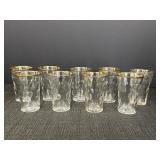 Set of 9 liquor/juice glasses w/gold color trim &