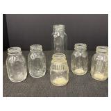 6 glass baby bottles, 5 Evenflo.  1-8oz, 4-4oz,