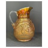 Vineyard Marigold carnival glass pitcher, 9in.,