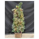 4ft artificial Christmas tree, some flocking &