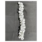 Strand of white bells, 13in long w/hook for