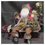 22in Tall Santa on Sled w/ Toy Bag & Tree