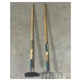 Old gardener  fork and hoe