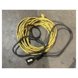 Brown and yellow extension cord