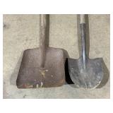 two garden shovels with wooden handles