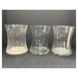 3- 8in tall clear glass hourglass vases