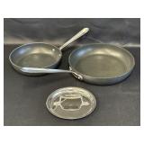 2 All-Clad skillets, 8in & 10in., & misc lid