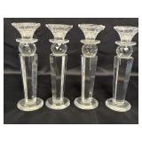Clear glass candlestick set of 4, tapered pillar &